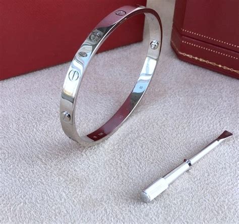 cartier bracelet men's white gold.